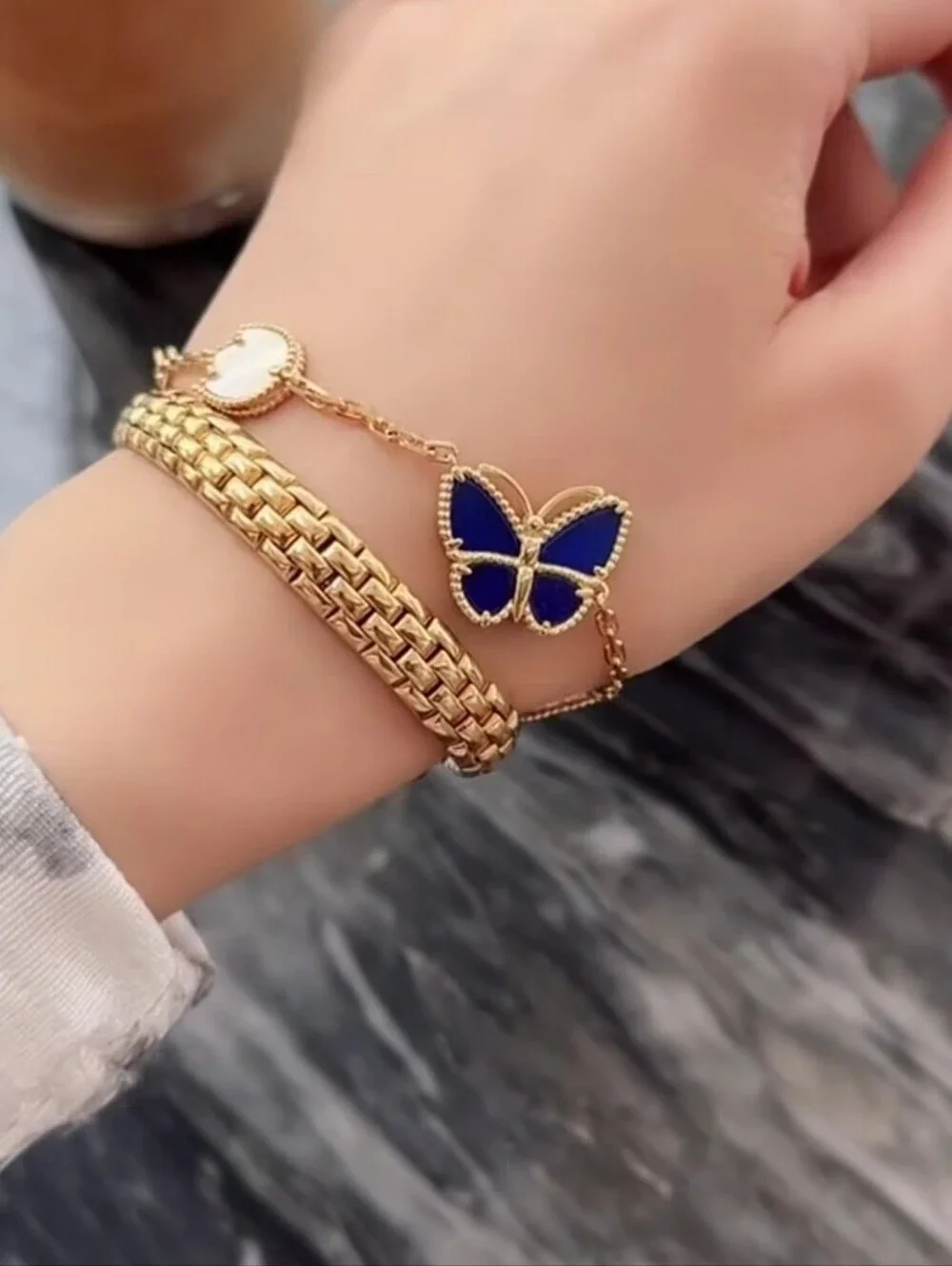 Gold Charm Bracelet with Blue Butterfly and Mother-of-Pearl Accents